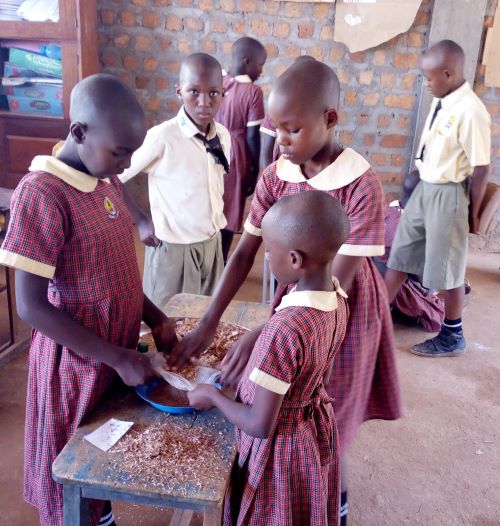 Children working together in Uganda